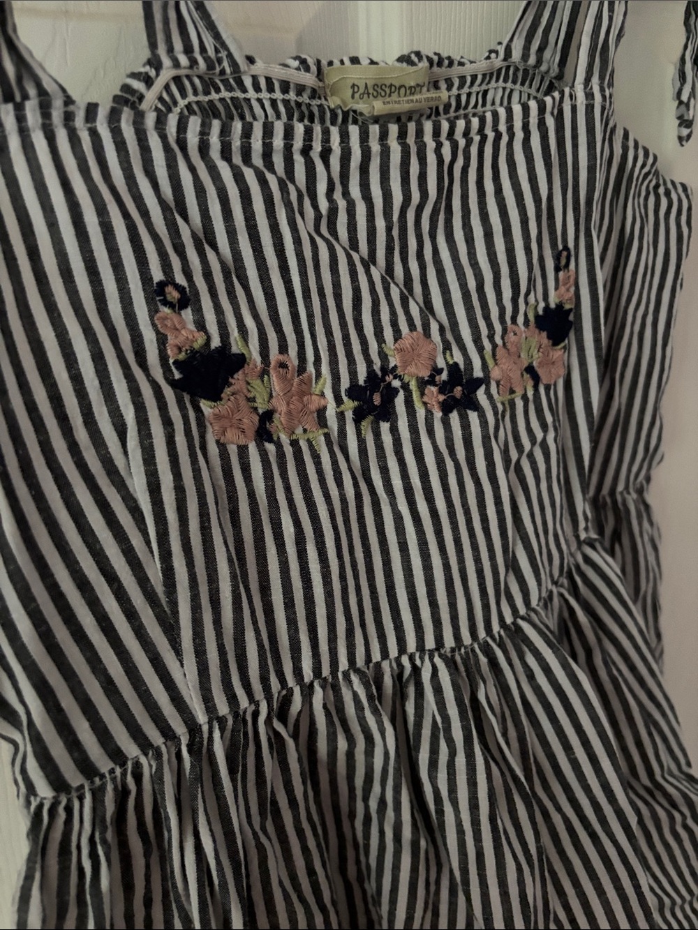 9. Passport Black and White Striped Tie-Shoulder Crop Top with Floral Embroidery